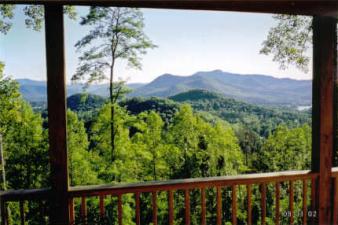 See the North Carolina mountains from the deck of this home in Hiawassee, GA